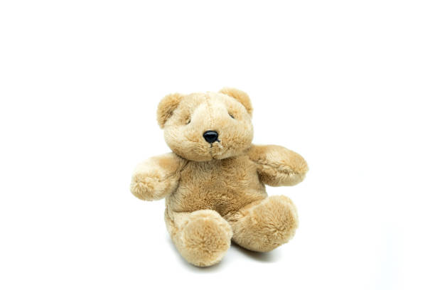 istock Cute Teddy Bear doll. Isolated on white background 1696716975