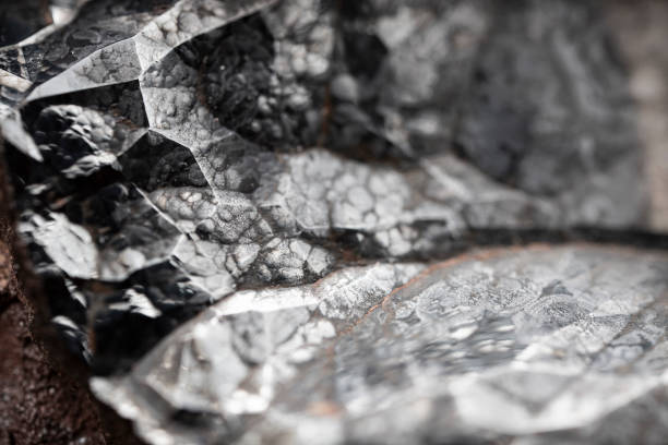istock Surface texture of raw hematite mineral. Iron ore. 1696723770