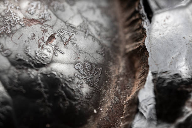 istock Surface texture of raw hematite mineral. Iron ore. 1696723790