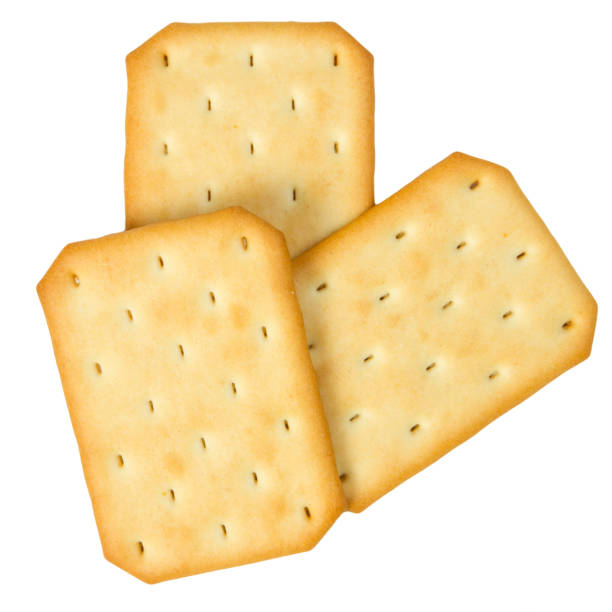 istock Top view of rectangle biscuits isolated on white background. Season's greetings. 1696729307