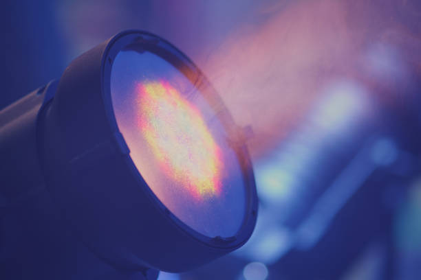istock Red stage lighting effect on the scene in the dark, close-up 1696730121