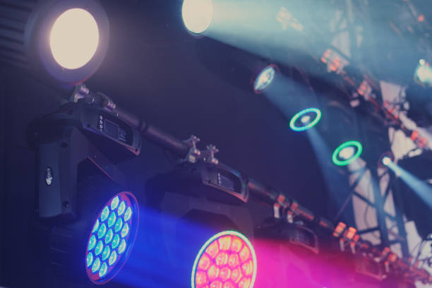 istock Red and blue stage lighting effect on the scene in the dark, close-up 1696730137