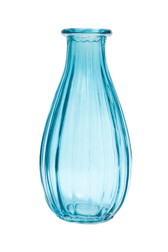 Blue glass vase isolated on a white background. Empty flower vase.