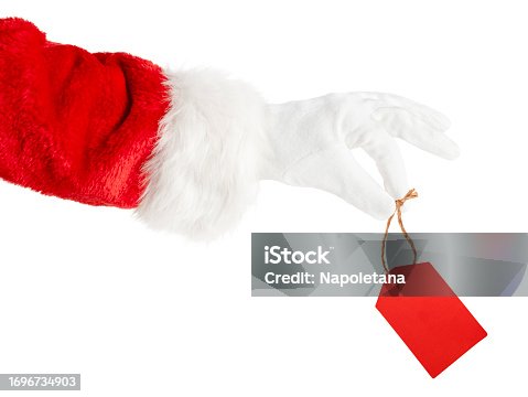 Santa holding a red sale label isolated on white background with clipping path.