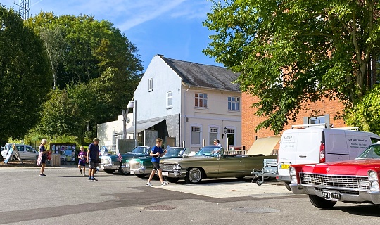 The photo was taken on September 9th 2023 in Tranebjerg, Samsø Island, Denmark. The Danish Cadillac Club is gathering, getting ready to take a road trip.