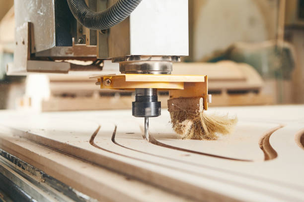 istock CNC router machine creates a layout of the shelf complex. 1696767236