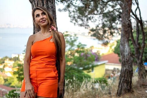 Woman relaxing to nature