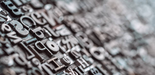 Close up of many old, random metal letters with copy space