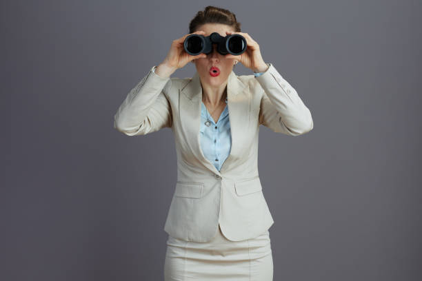 istock surprised elegant female employee in light business suit 1696816227