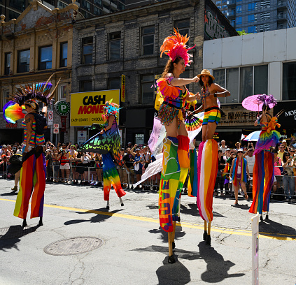 Toronto, Canada - June 25, 2023: The Pride Toronto Parade is organized by Pride Toronto, a non-profit organization. It hosts the annual Pride Month celebrations in Toronto, Canada, which attracts millions of attendees from around the globe.