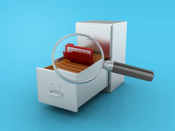 istock Archives with Folders and Magnifying Glass 1696958080