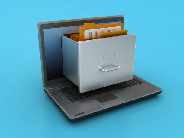 istock Archives with Folders and Laptop 1696960200