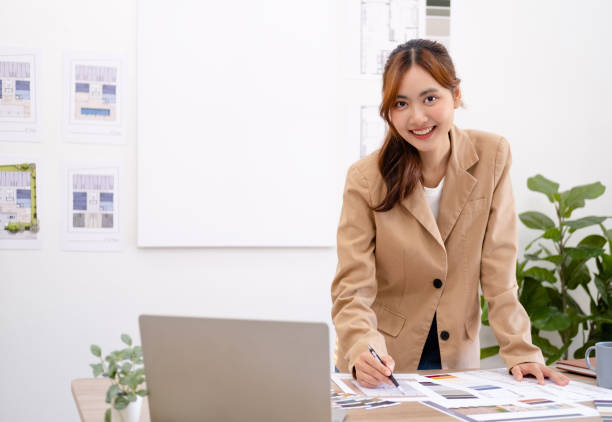 istock Portrait of young female architect working on project. 1697058629
