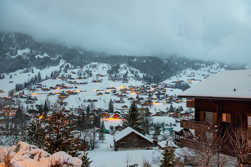 Aerial view panorama of a snow-covered village in the mountains. Vorarlberg, Schoppernau