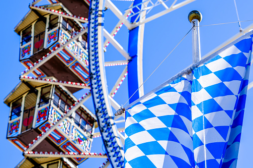 Munich, Germany - September 21: famous Ferris Wheel and decoration at the Oktoberfest in Munich on September 21, 2023