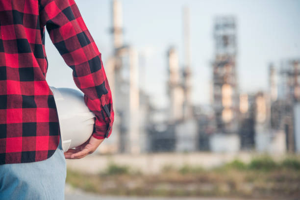 istock Woman construction engineer wear safety white hard hat at construction site industry worker. Female engineer worker civil engineering with hard hat safety helmet. Woman construction Engineer concept 1697114026