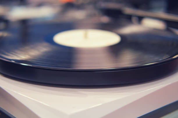 istock Turntable vinyl record player, close-up view, selective focus 1697123538