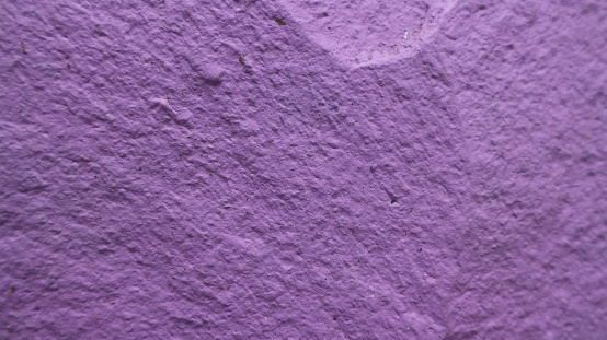 Abstract purple cement wall texture and background