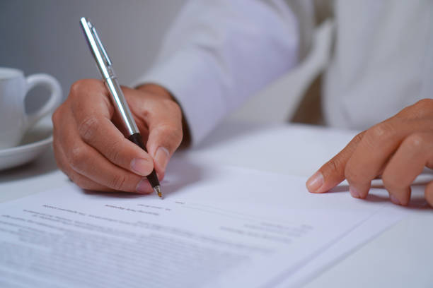 istock Man Signing Contract, Employment Agreement or Company Decision Concept 1697145848