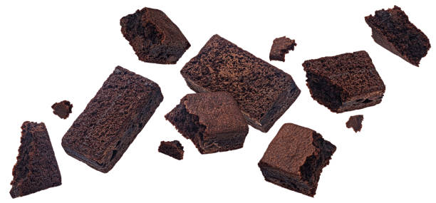 istock Flying chocolate brownie isolated on white background with clipping path 1697147875