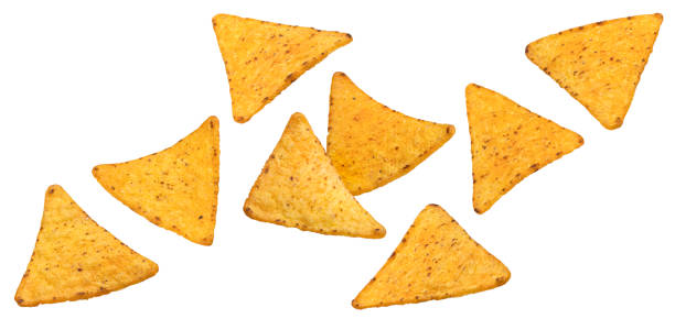 istock Falling corn chips, hot mexican nachos isolated on white background 1697147886