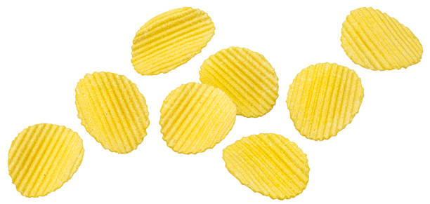 istock Ridged potato chips isolated on white background 1697147896