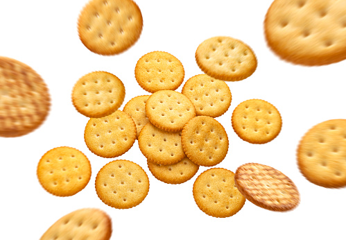 Falling round cheese crackers isolated on white background with copy space, top view