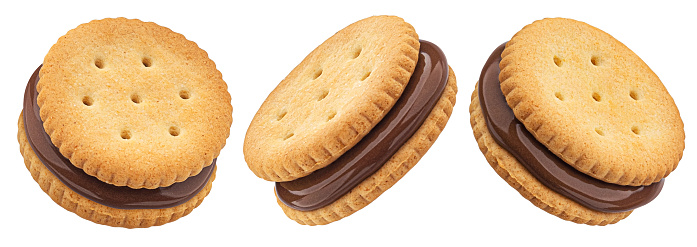 Sandwich cookies, chocolate cream filled biscuits isolated on white background with clipping path, full depth of field