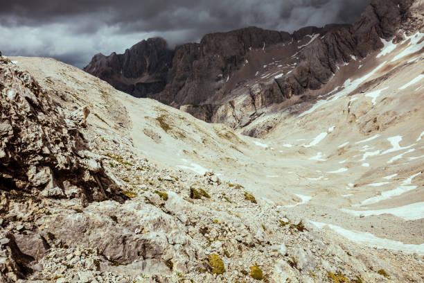 istock landscape with mountains, clouds and rocks 1697149901
