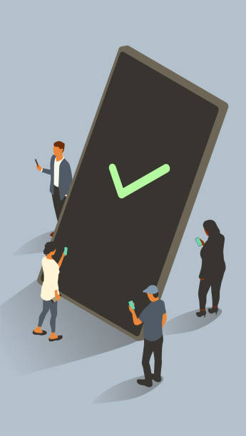 A green checkmark displays on a mobile phone over a blank black screen. The device is oversized and shown vertically. It's surrounded by a group of smartphone users, consisting of diverse men and women leveraging mobile apps and the internet. No specific manufacturer is represented, and icons are created by the illustrator from scratch. Vector isometric illustration appears over a muted background within a 9x16 vertically-oriented artboard. No artificial intelligence was used in the creation of this image.