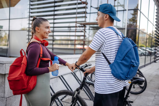 istock Young couple having a talk after sport training at open gym 1697151089