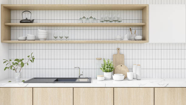 istock Modern kitchen interior, modern minimalist style, large white marble counter top. wooden counter with plates, bowls, ceramics, clear glass, sinks, built-in furniture, wooden cabinets.3D render 1697168162