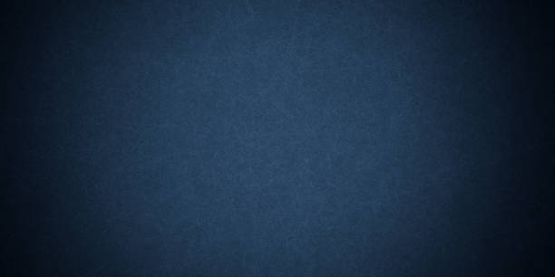 Rough texture of classic solid navy blue tone color paint on environmental friendly cardboard box blank paper texture background with space and minimal design grunge style