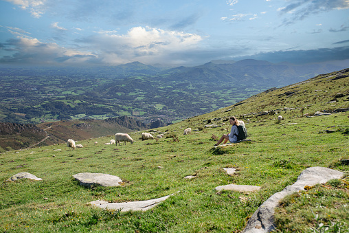 Teenage girl hiking on the mountain of (La Rhune) in the French Basque Country