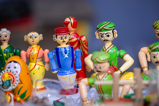 Handmade wooden toys, Wood made Toys for Kids in display at Surajkund Craft Fair. Selective focus.