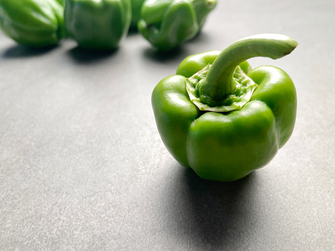 Fresh green bell peppers with copy space