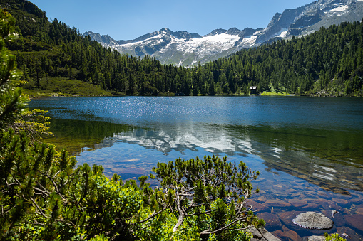 Tranquil lake in the mountains. Aerial shot. Bulgaria. Muratov Lake. Pirin National Reserve