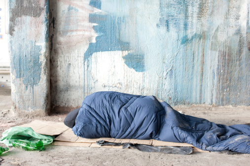 Homeless And Hungry Man Sleeping On Street With Signboard