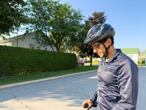 istock Cyclist pedaling on the street 1697285992
