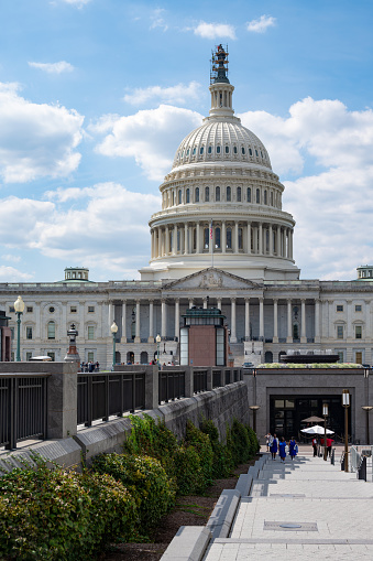Washington, DC - September 20, 2023: The United States Capitol and steps leading the the underground visitor center for the capitol.