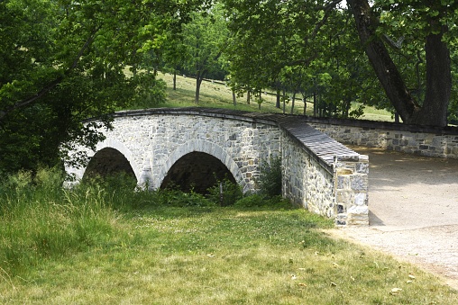 The historic Burnside bridge spans the Antietam Creek at Antietam National Battlefield.