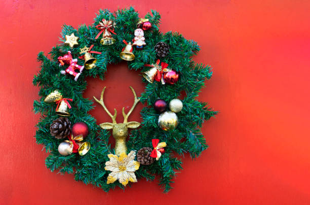 istock Christmas composition. Christmas red decorations, fir tree branches on red background. Flat lay, top view, copy space 1697345422