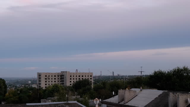 Pink Gray Blue Sunset over Industrial City. Timelapse. 4K