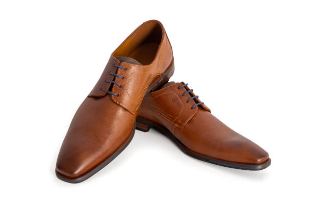 istock Brown shoes for men, isolated on white background 1697349765