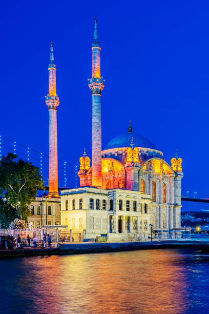 Ortakoy Mosque (Buyuk Mecidiye Camii) in Istanbul, Turkiye at night.