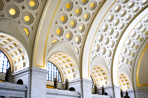 Union Station Ceiling in Washington DC with decorative design and windows.