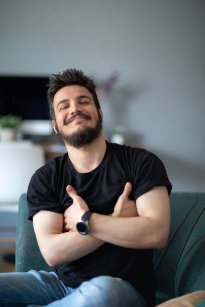 istock Portrait of smiling handsome man 1697422996
