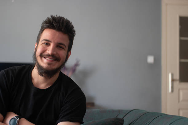 istock Portrait of smiling handsome man 1697426737