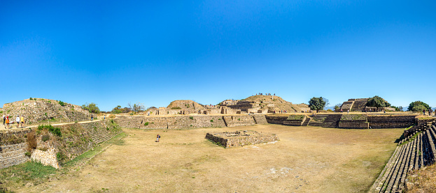 Monte Alban, Oaxaca, Mexico, South America - January 2018: [Biggest ruins of ancient Zapotec city at the top of the mountain, UNESCO archeological site, pyramids]