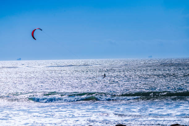 istock Kitesurfing at Jalama Beach. 1697498120